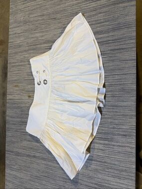 Attega White Ruffled Micro Doll Skirt with Grommet Detail